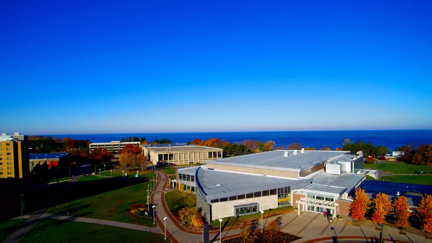 Campus in the fall with lake in background