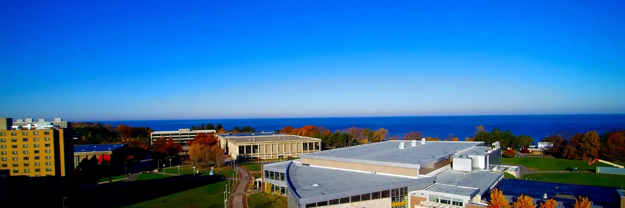 Campus in the fall with lake in background